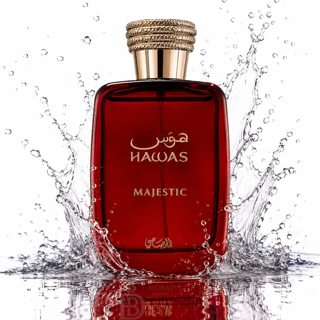 A red glass perfume bottle labeled 'HAWAS MAJESTIC' with a gold cap, surrounded by water splashes on a white background.